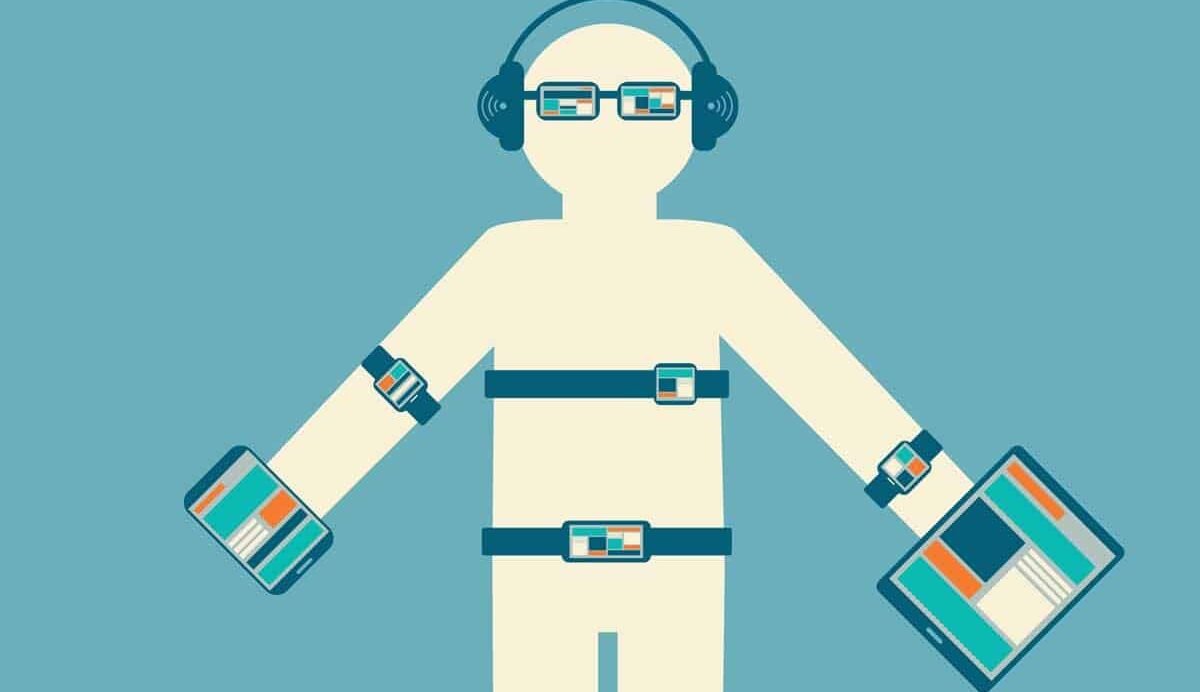 Illustration d'une personne équipée de divers appareils technologiques portables