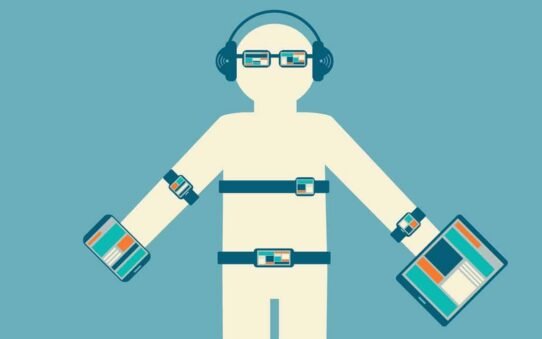 Illustration d'une personne équipée de divers appareils technologiques portables