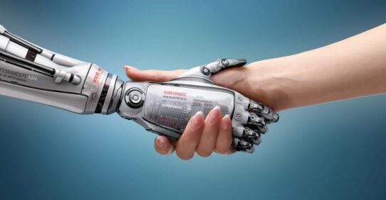 Poignée de main entre une main humaine et une main robotique