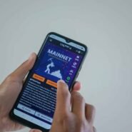 Mainnet sur un smartphone tenu par une main