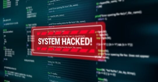 Écran d'ordinateur montrant un message de système piraté