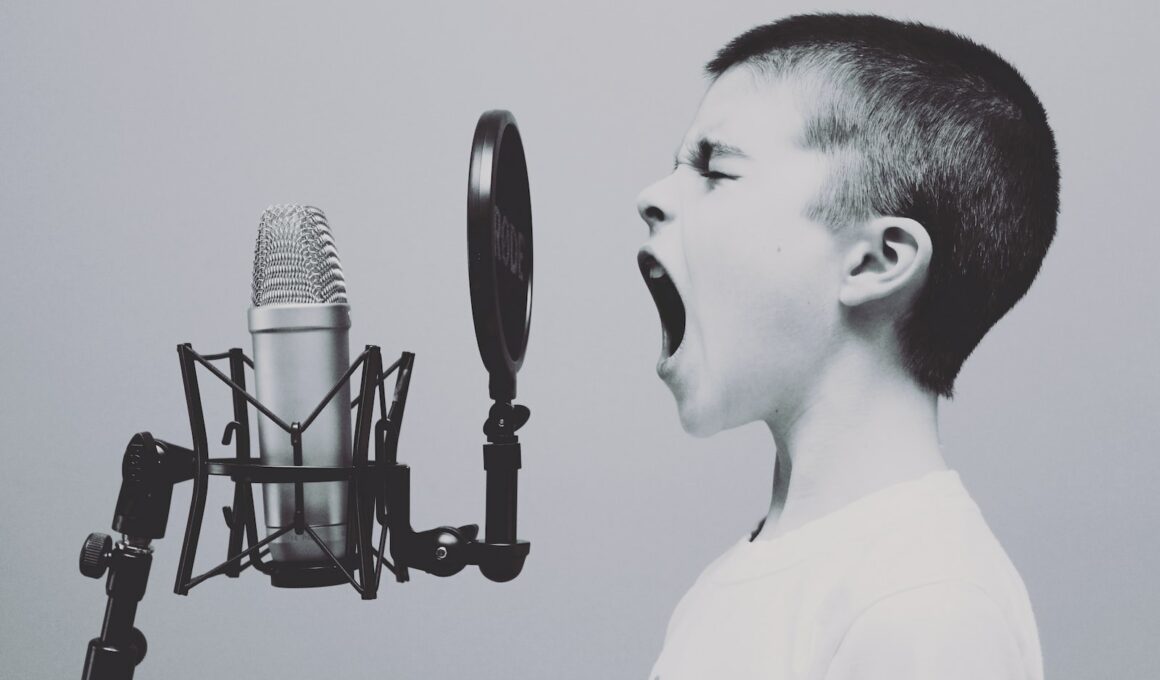 boy singing on microphone with pop filter