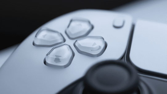 Gros plan sur les boutons d'une manette de jeu moderne