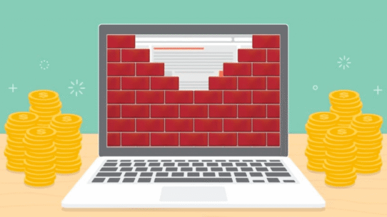 Ordinateur avec mur de briques et piles de pièces d'or