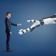 Homme en costume tendant la main vers un bras robotique