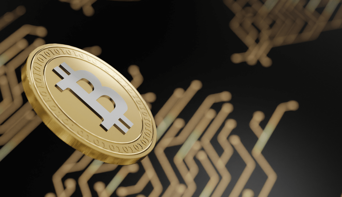 Pièce de Bitcoin sur fond de circuits électroniques