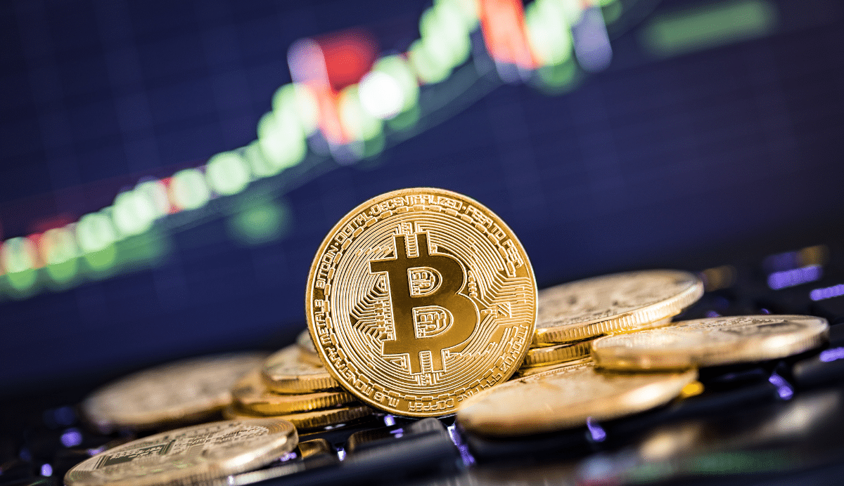 Pièces de Bitcoin avec graphique de cours en arrière-plan