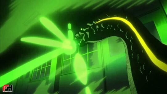 Créature projetant un rayon vert lumineux à l'intérieur d'un bâtiment