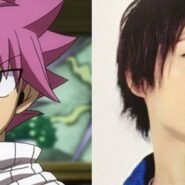 Personnage d'anime avec cheveux roses et homme aux cheveux noirs