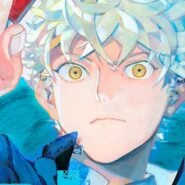 Jeune artiste tenant un pinceau coloré