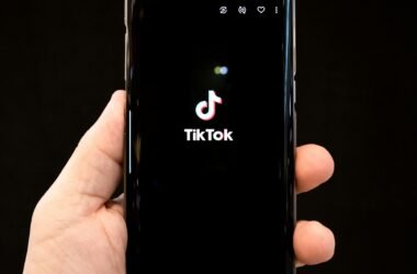 black android smartphone displaying 12 00