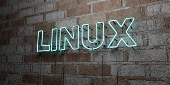Enseigne néon Linux sur mur de briques